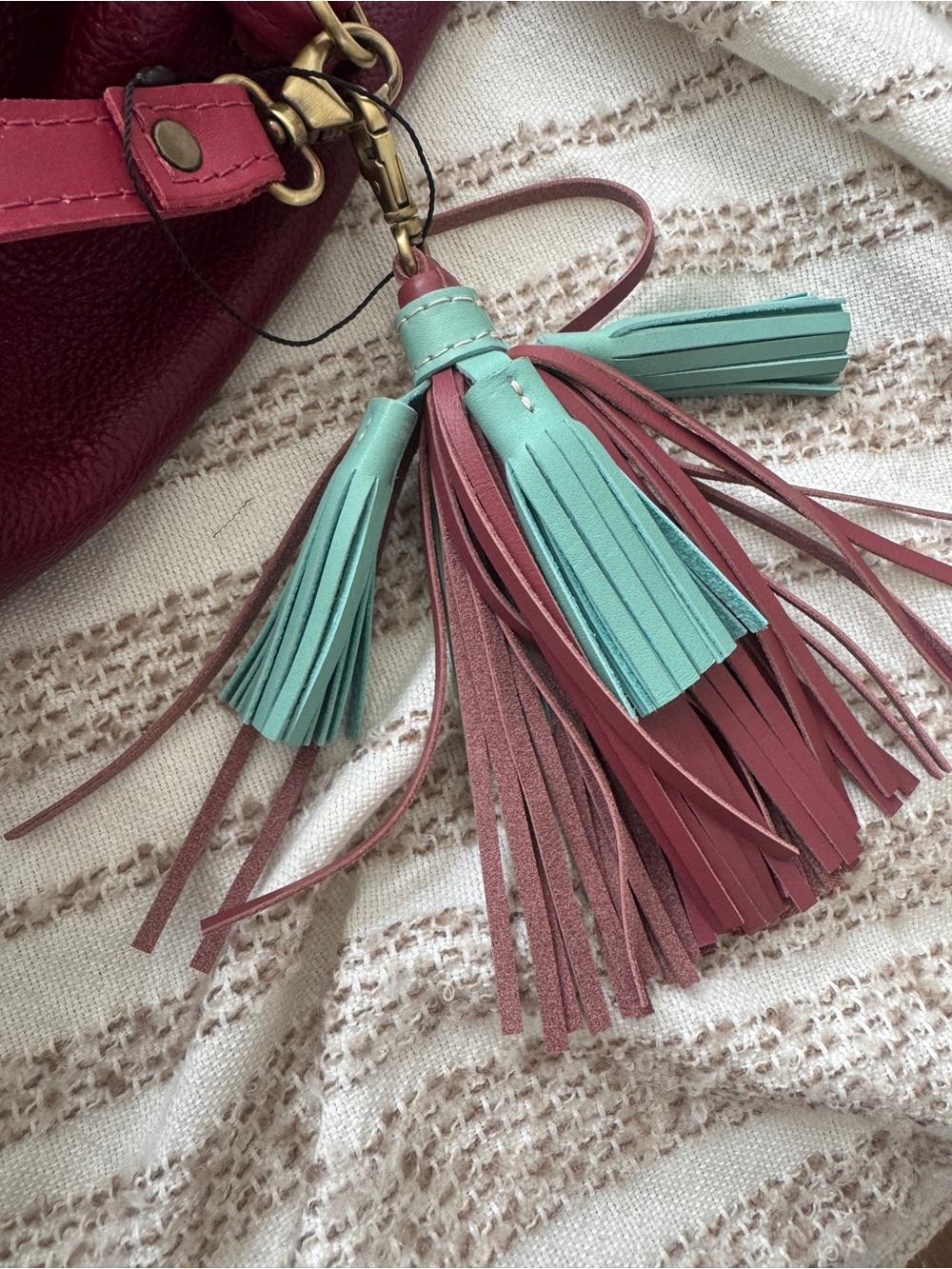Portland Leather Berry Red Drawstring Bucket Bag with Tassels - charm included - Picture 5 of 8